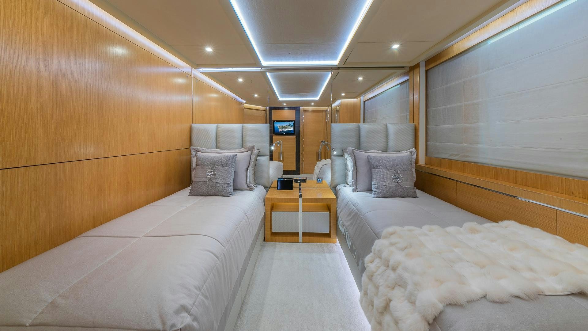 a room with two beds aboard DB9 Yacht for Sale