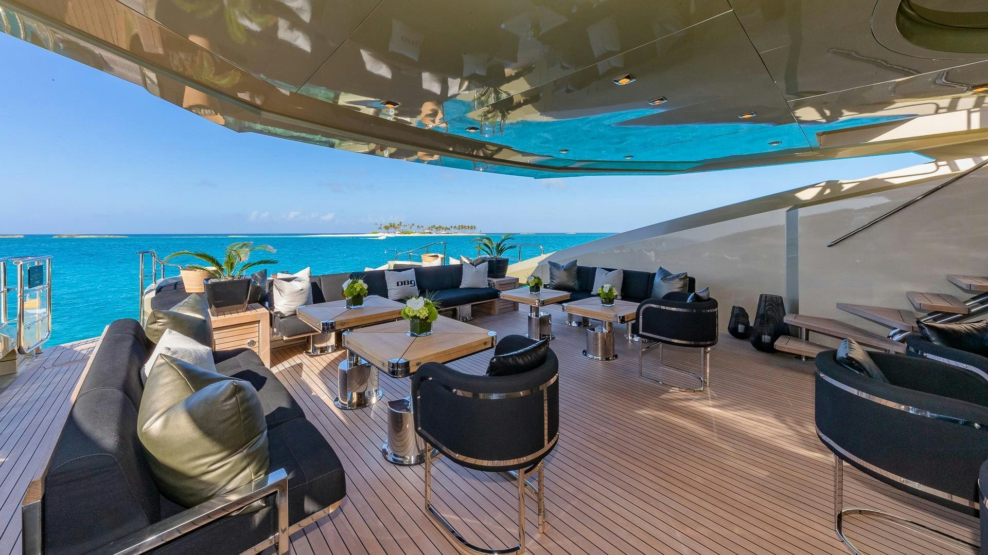 a large room with a large pool aboard DB9 Yacht for Sale