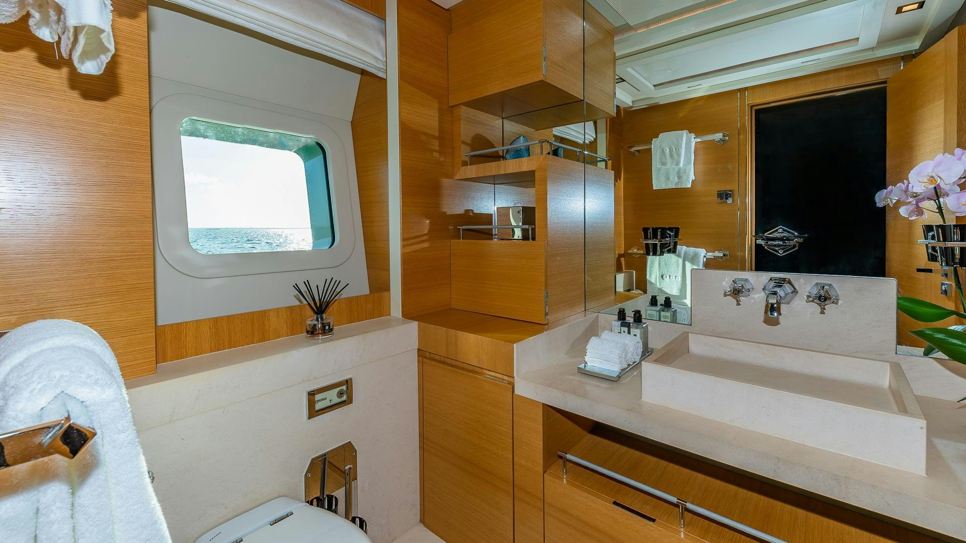 a kitchen with a large island aboard DB9 Yacht for Sale