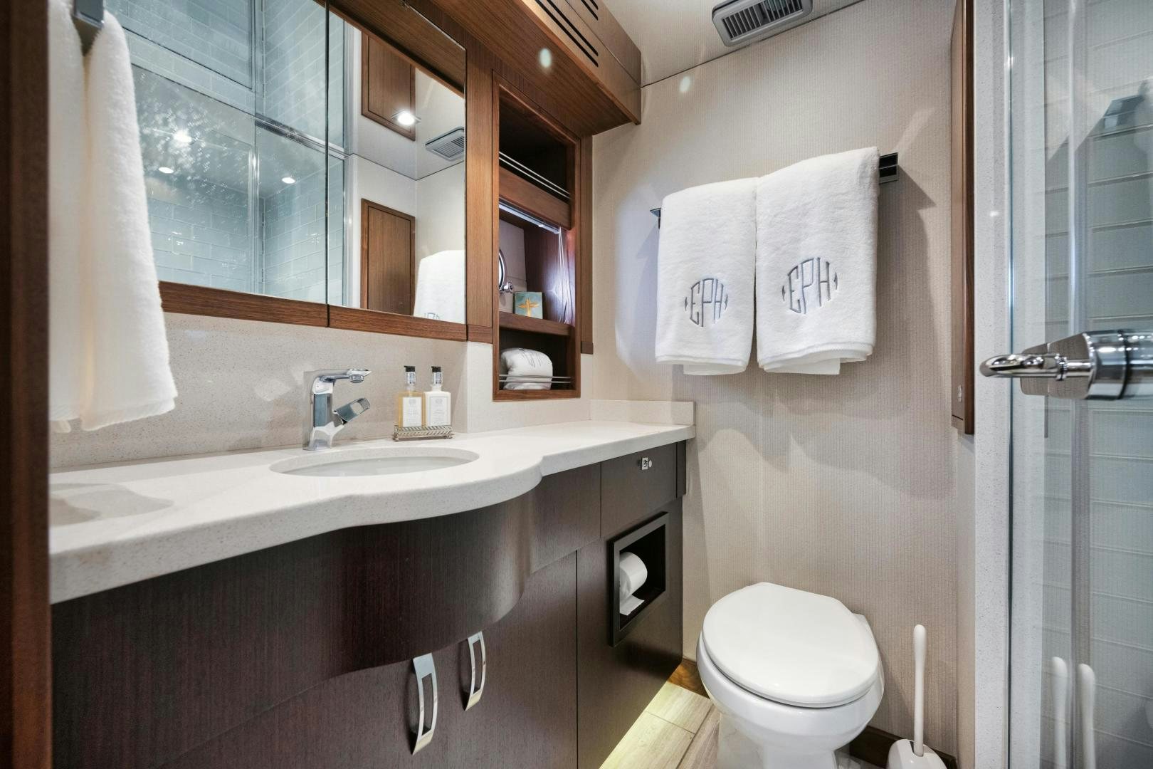 a bathroom with a sink and a toilet aboard EMMY Yacht for Sale