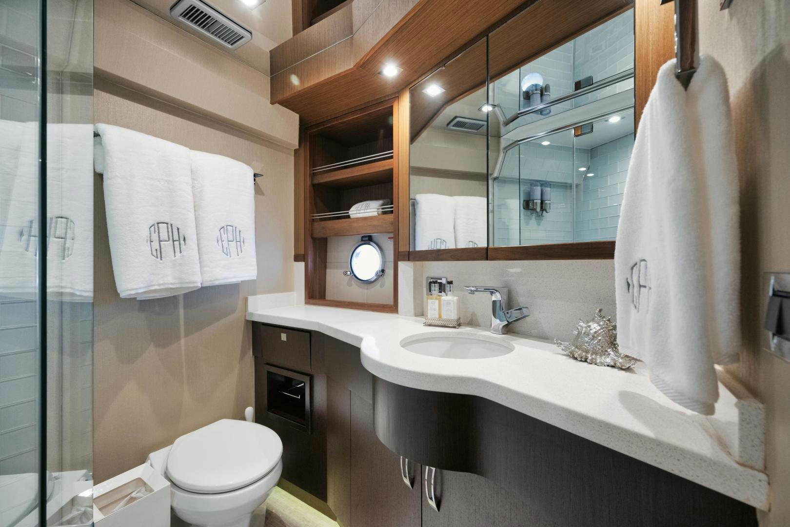 a bathroom with a sink and a toilet aboard EMMY Yacht for Sale