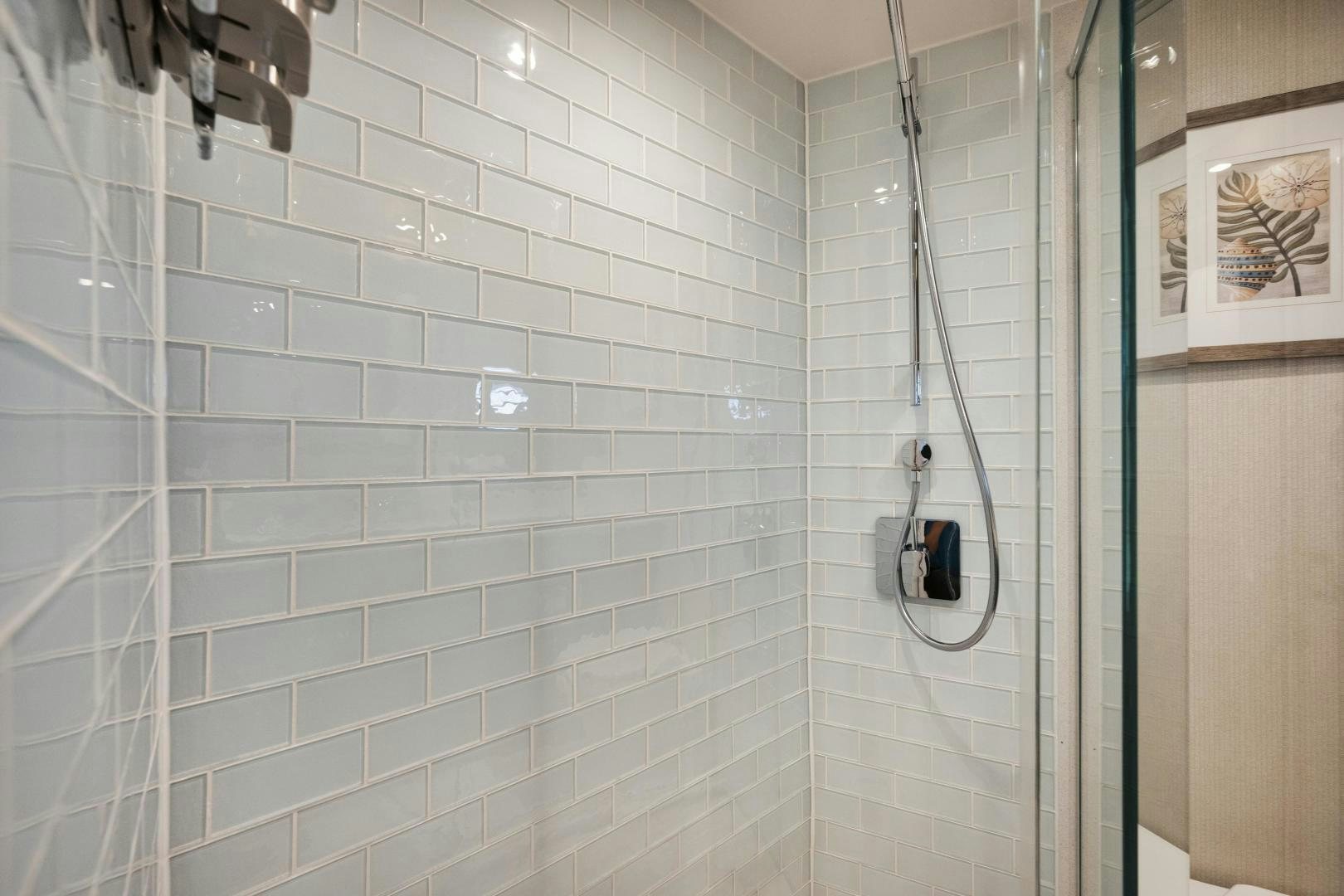 a shower with a black object from it aboard EMMY Yacht for Sale