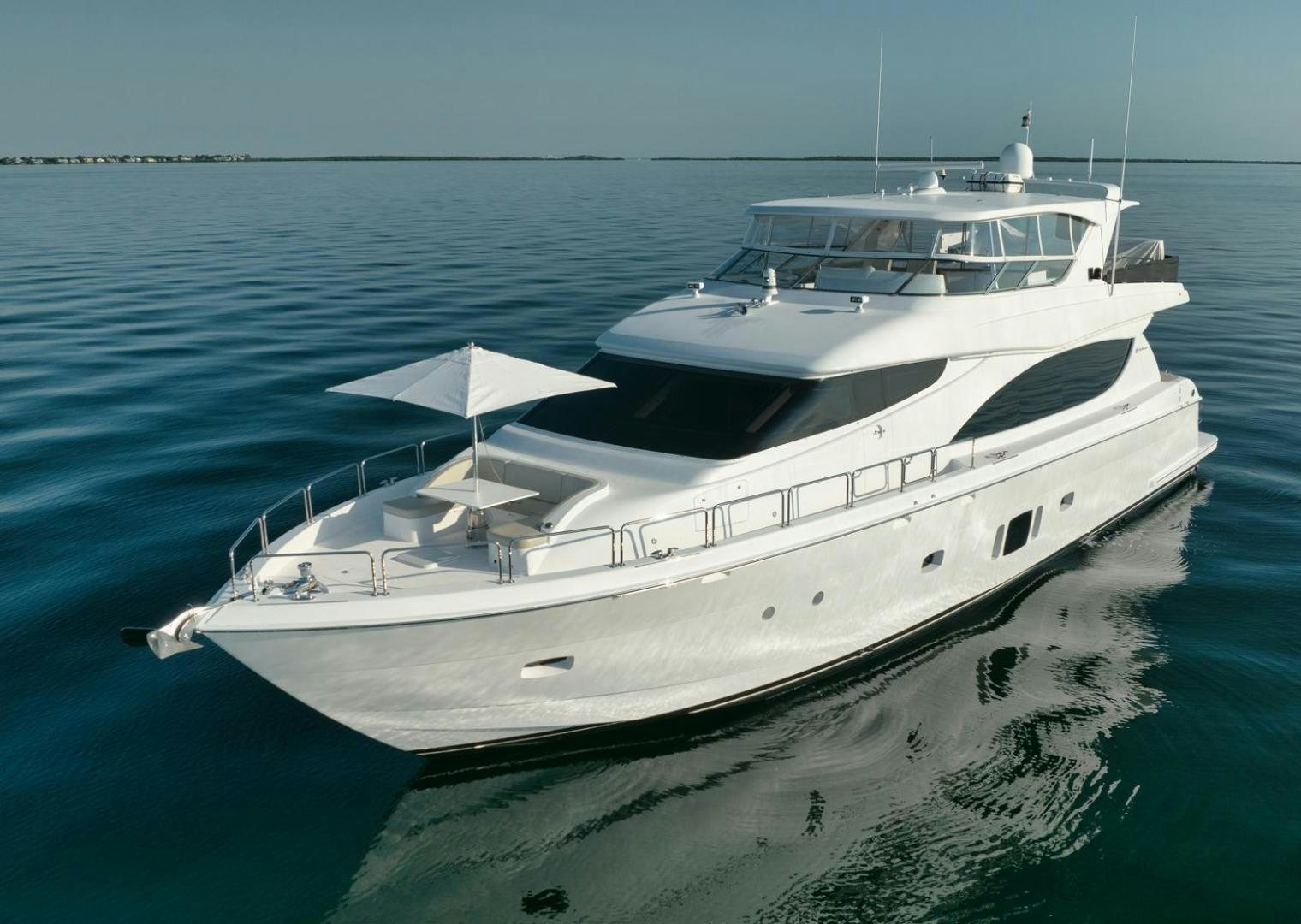 a white yacht in the water aboard EMMY Yacht for Sale