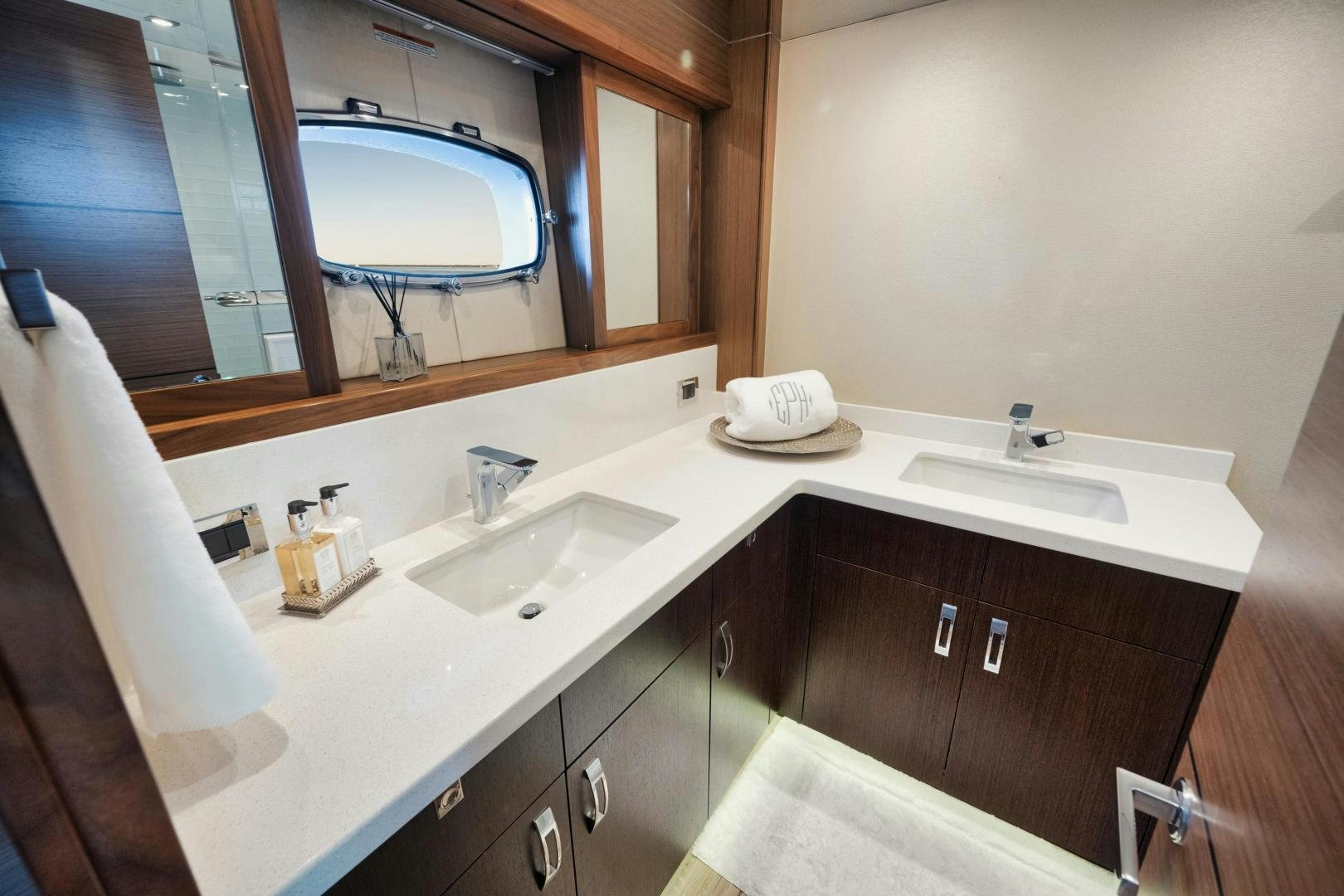 a bathroom with two sinks aboard EMMY Yacht for Sale
