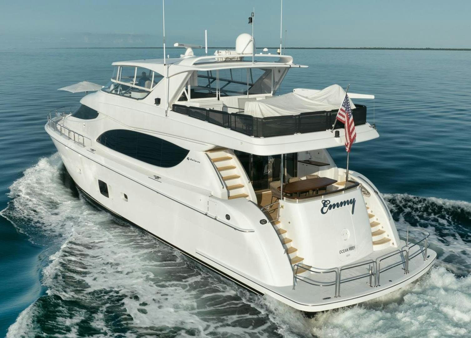 a white yacht on the water aboard EMMY Yacht for Sale