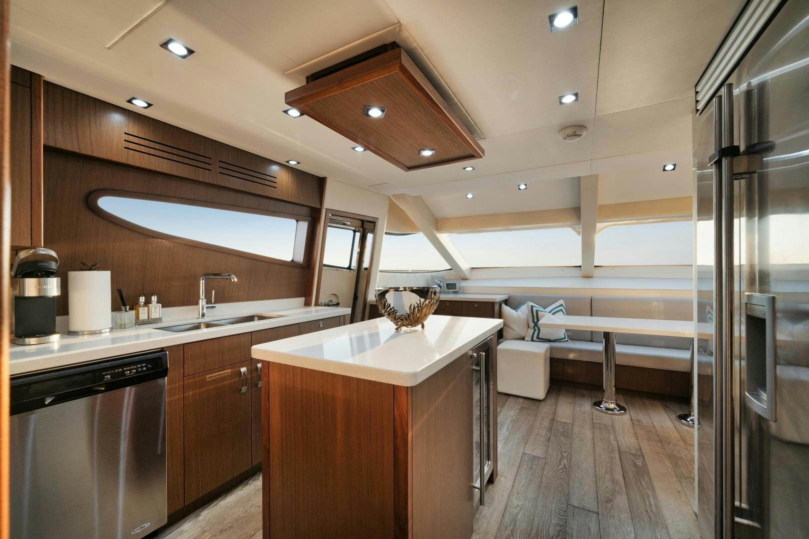 a kitchen with a large window aboard EMMY Yacht for Sale