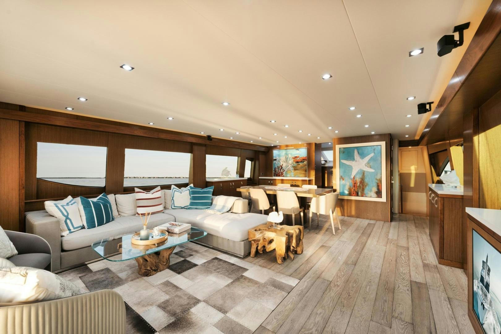 a living room with a large window aboard EMMY Yacht for Sale