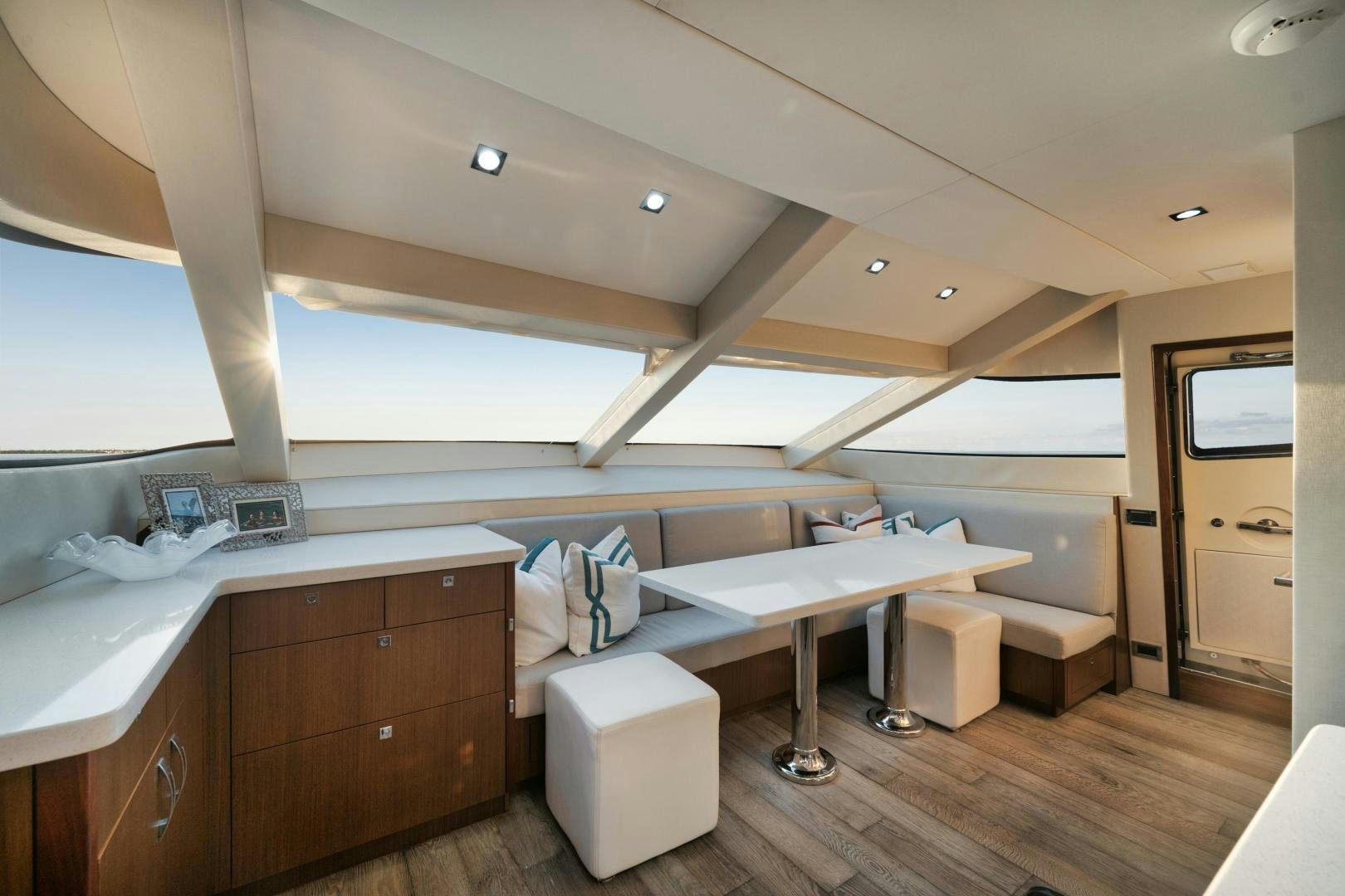 a room with a desk and a large window aboard EMMY Yacht for Sale