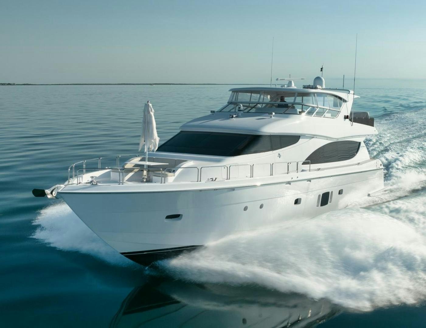 a white yacht on the water aboard EMMY Yacht for Sale