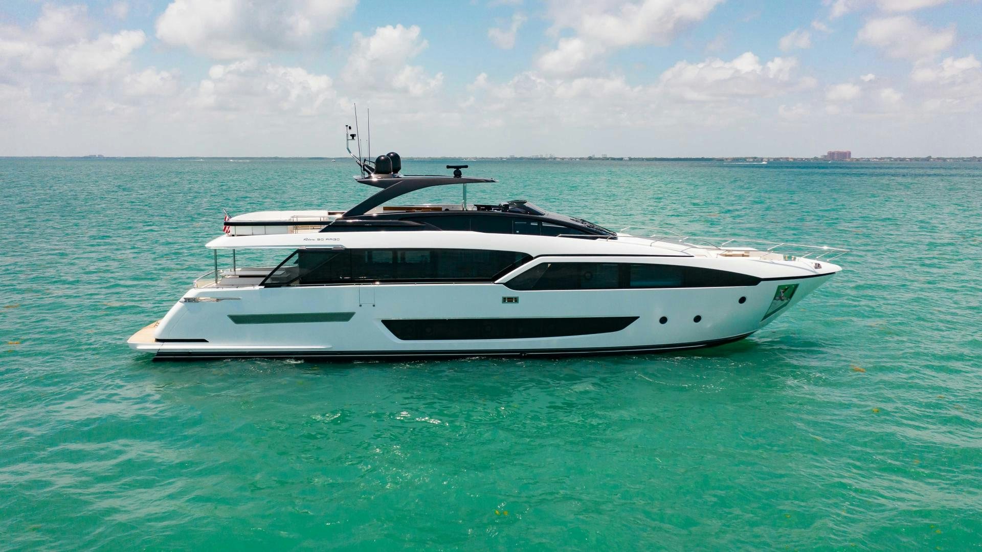 a white boat in the water aboard KIYOMIZU Yacht for Sale