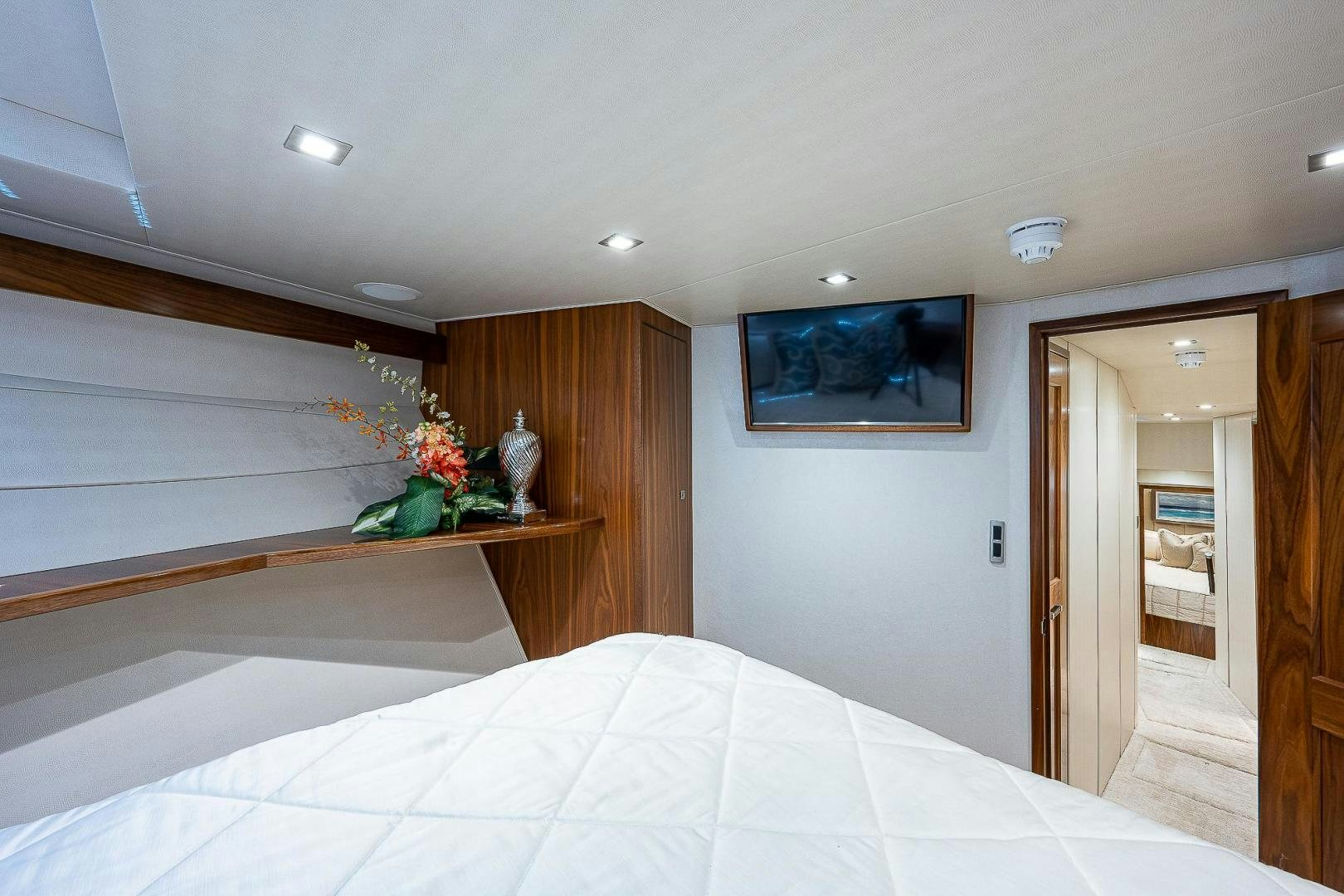 a bed in a room aboard KALEEN Yacht for Sale