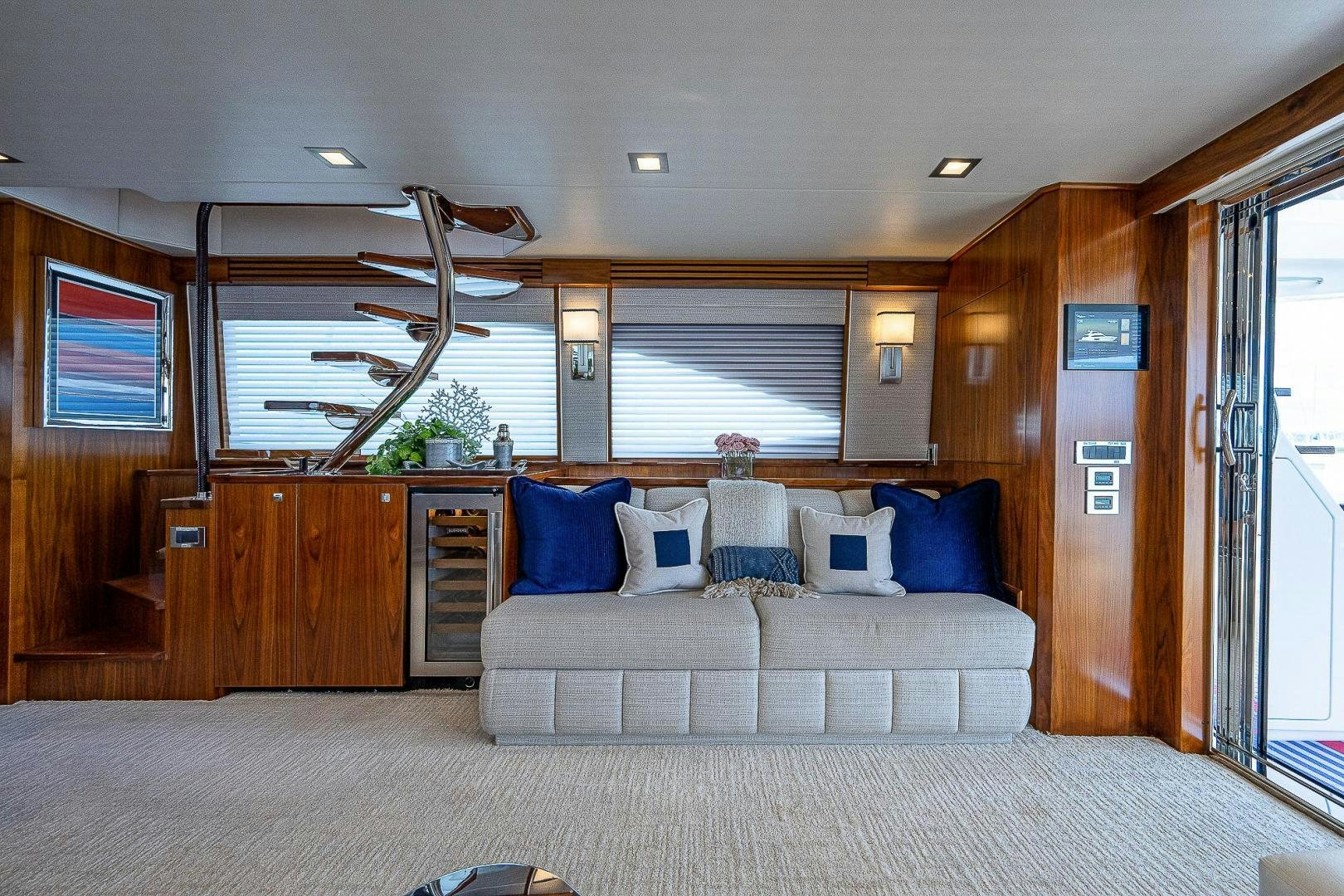 a large living room with a large bed and a large window aboard KALEEN Yacht for Sale