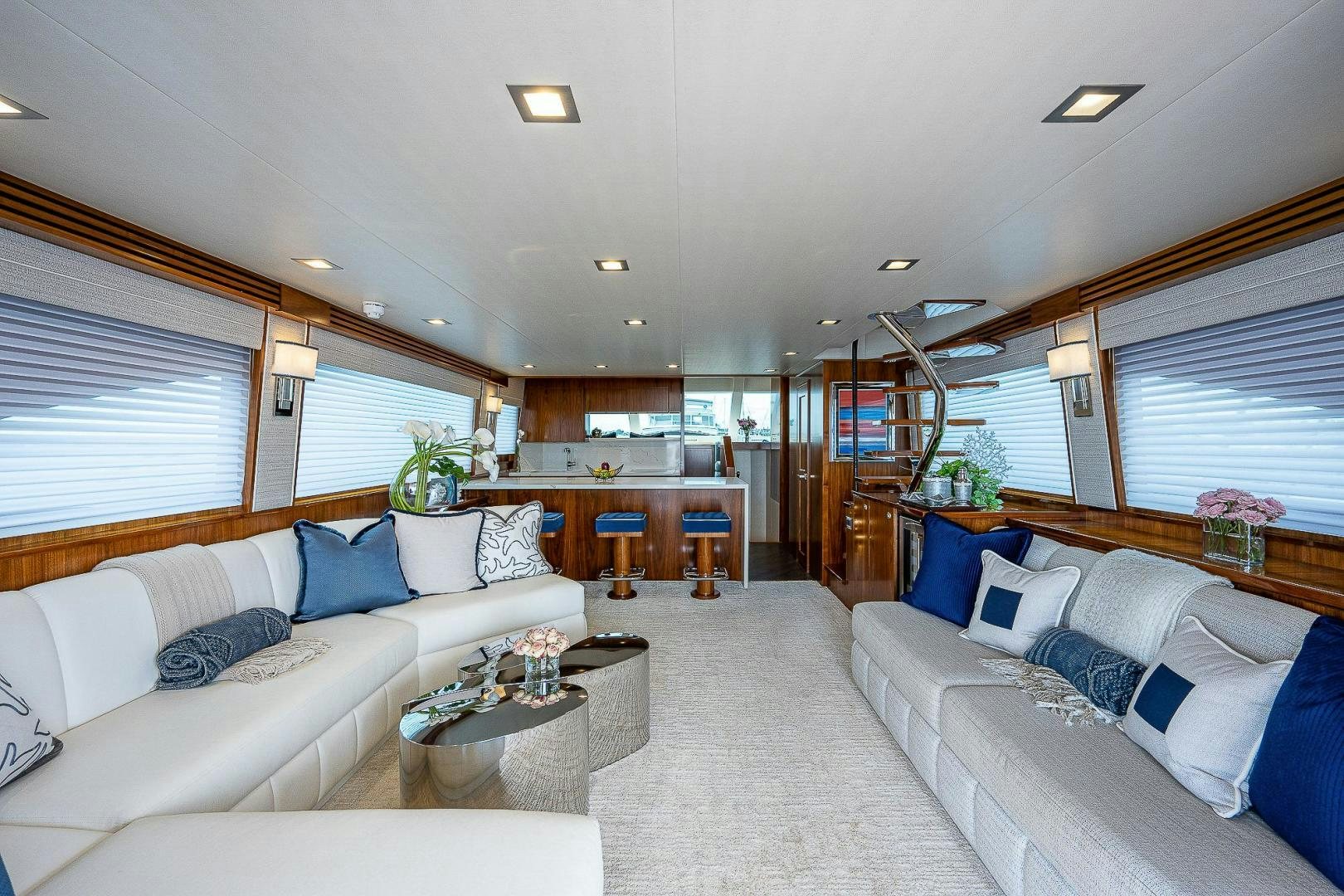 a living room with a couch and a table aboard KALEEN Yacht for Sale
