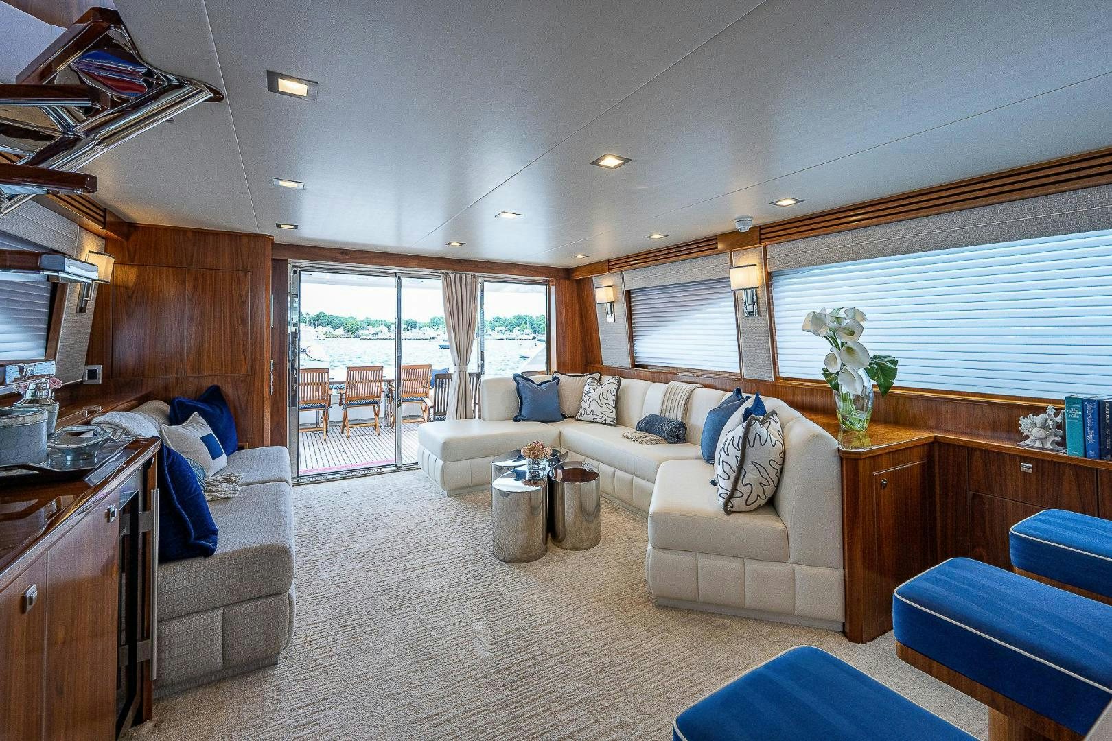 a living room with a couch and a table aboard KALEEN Yacht for Sale