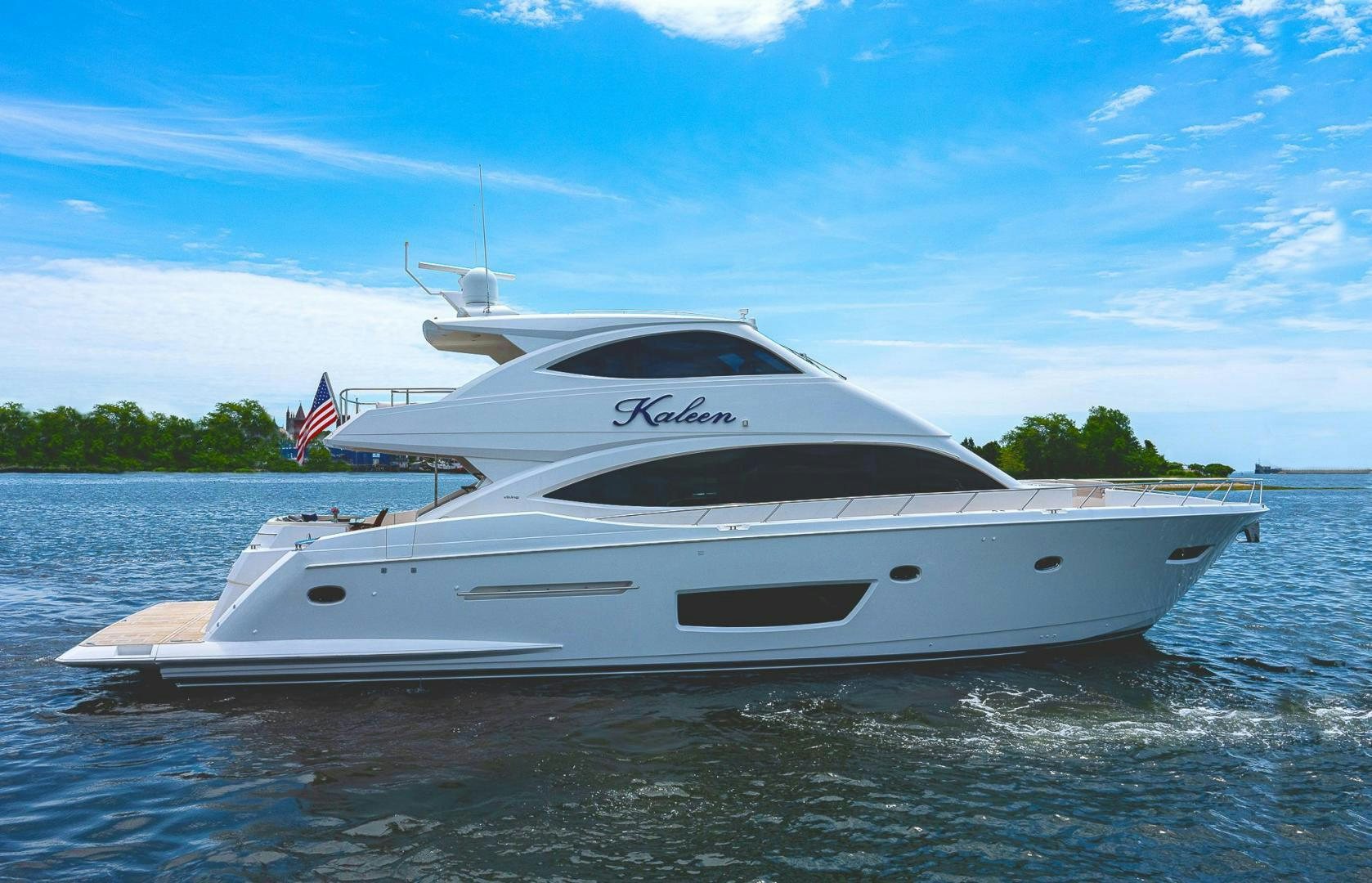 a white yacht on the water aboard KALEEN Yacht for Sale