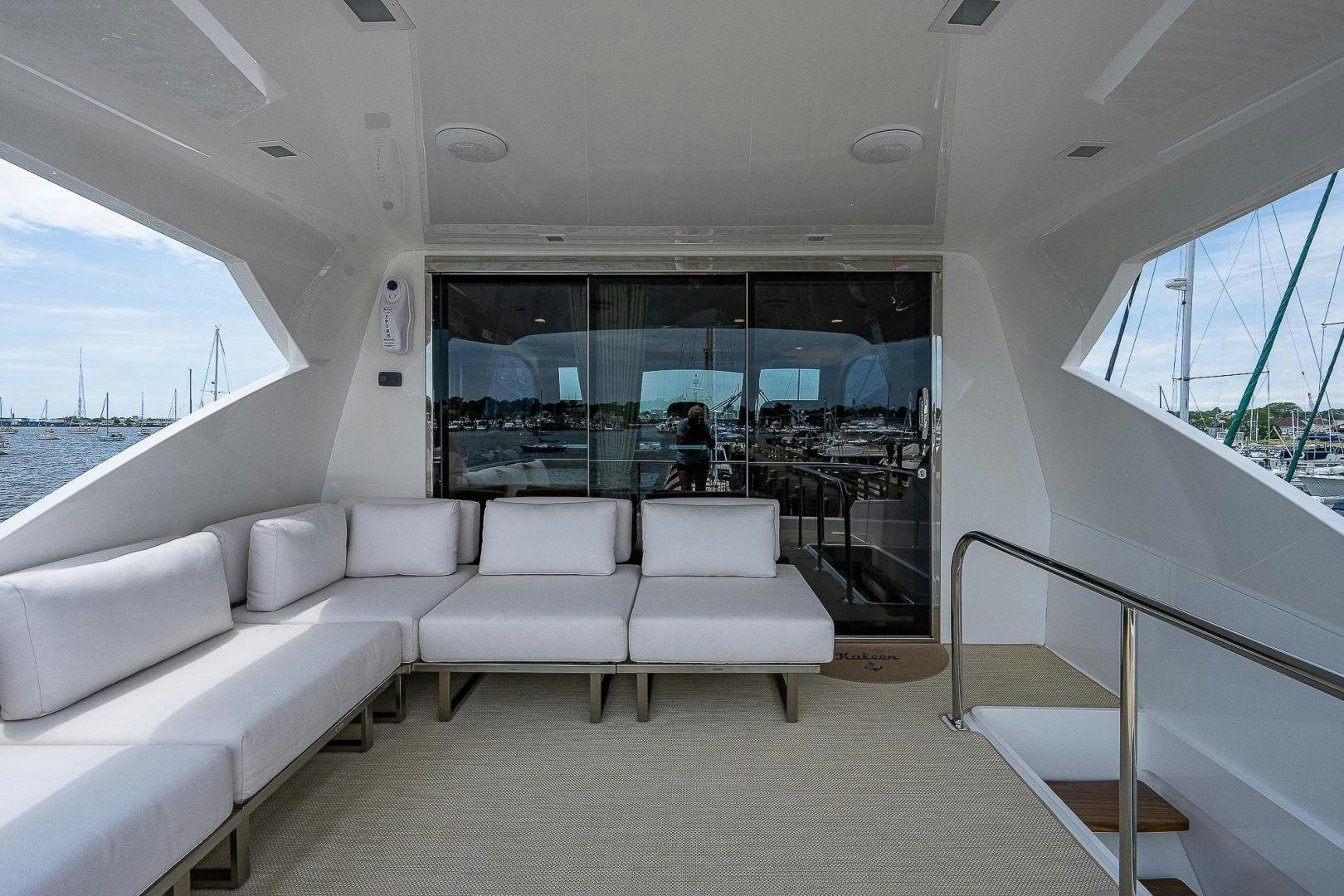 a white car with a view of the ocean and the ocean aboard KALEEN Yacht for Sale