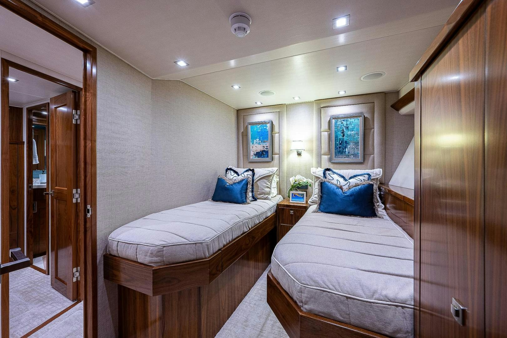 a couple of beds in a hotel room aboard KALEEN Yacht for Sale