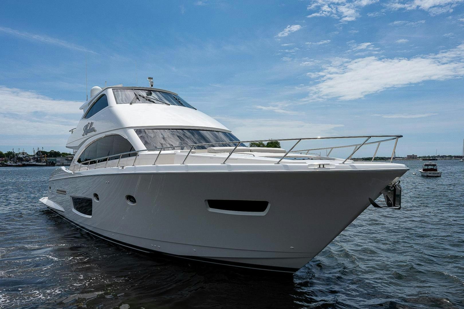 a white yacht on the water aboard KALEEN Yacht for Sale
