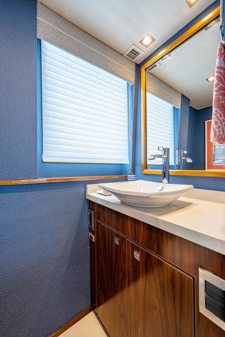 a bathroom with a sink and a mirror aboard KALEEN Yacht for Sale