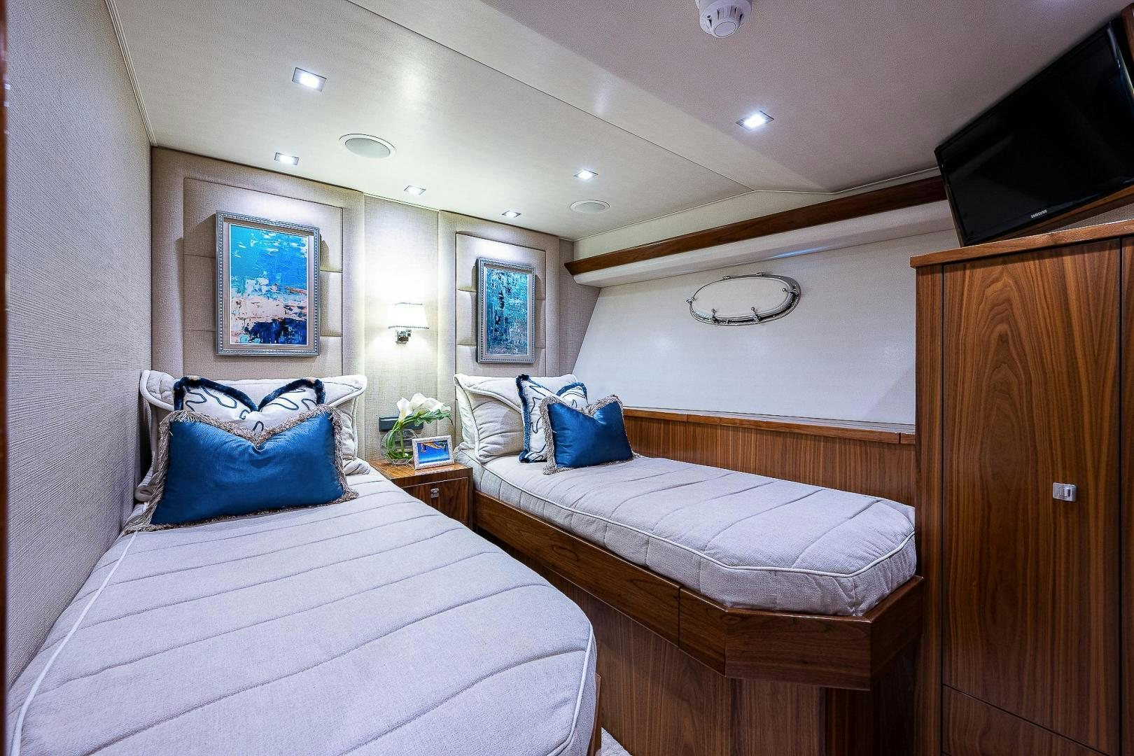 a couple of beds in a room aboard KALEEN Yacht for Sale