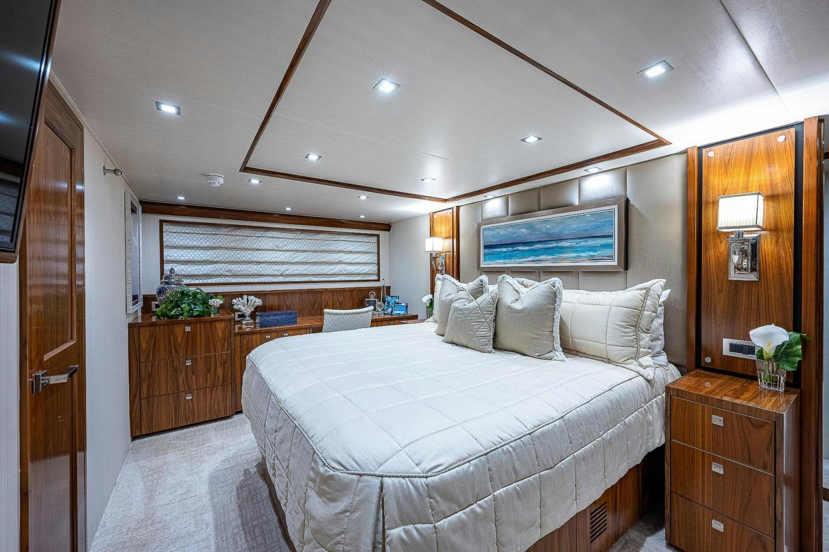 a large bedroom with a large bed aboard KALEEN Yacht for Sale