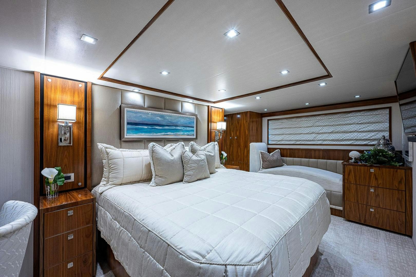 a hotel room with a bed and a television aboard KALEEN Yacht for Sale