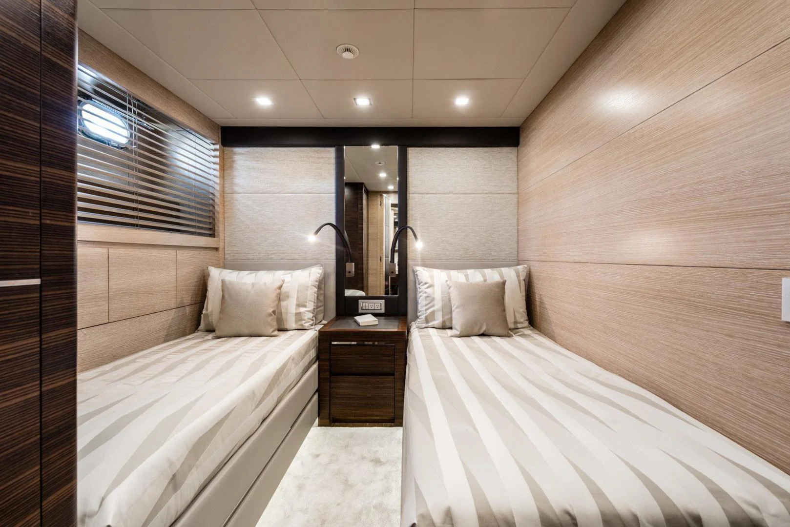a room with a couple of beds aboard WINGS SPREAD Yacht for Sale