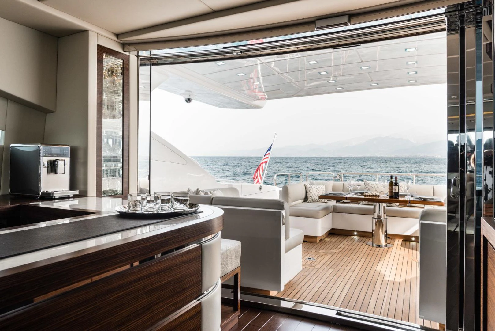 a large open kitchen with a view of the ocean aboard WINGS SPREAD Yacht for Sale