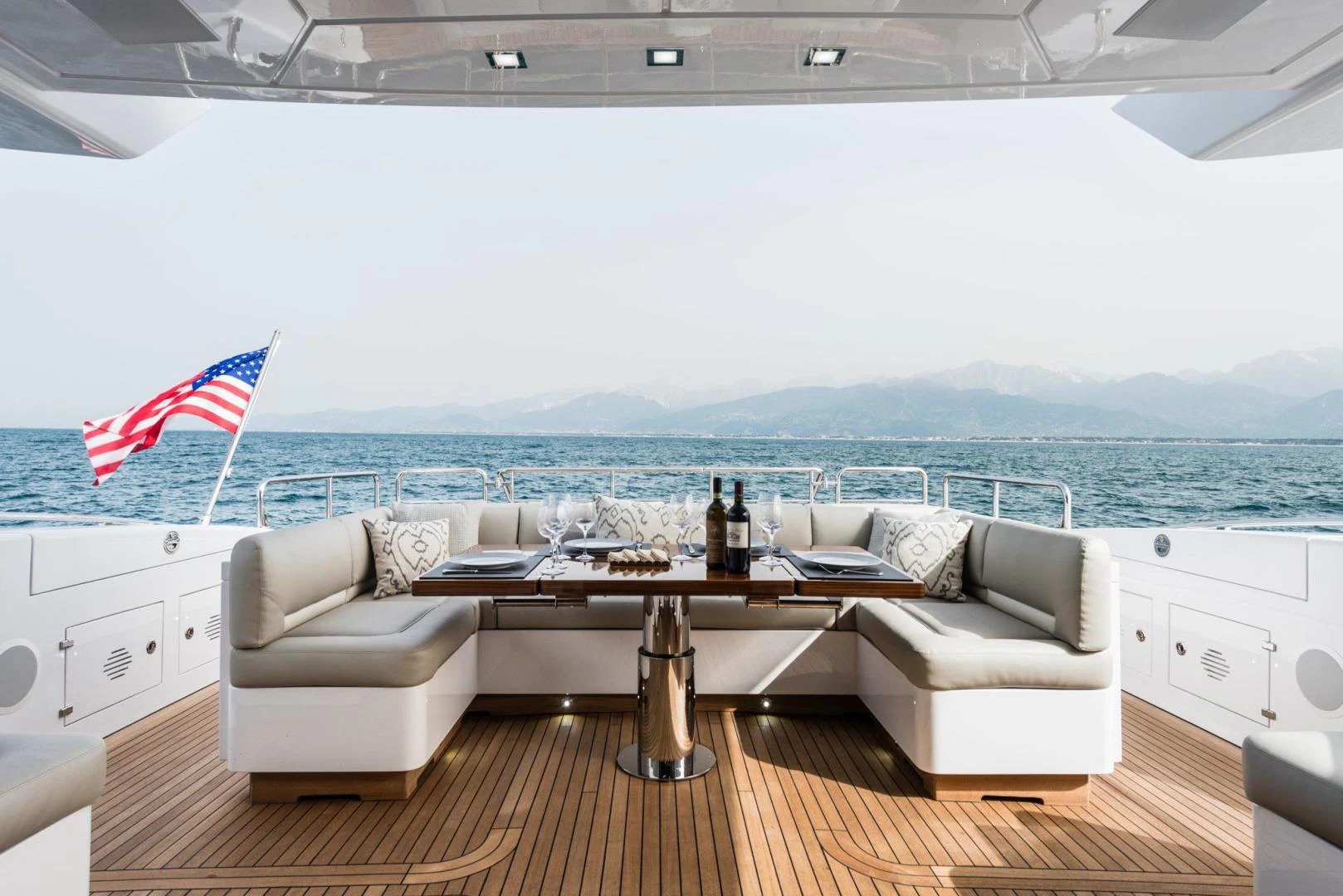 a living room with a large window aboard WINGS SPREAD Yacht for Sale