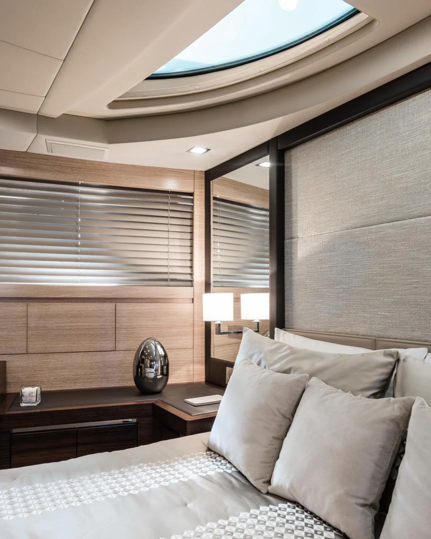 a bed with a blue ceiling aboard WINGS SPREAD Yacht for Sale
