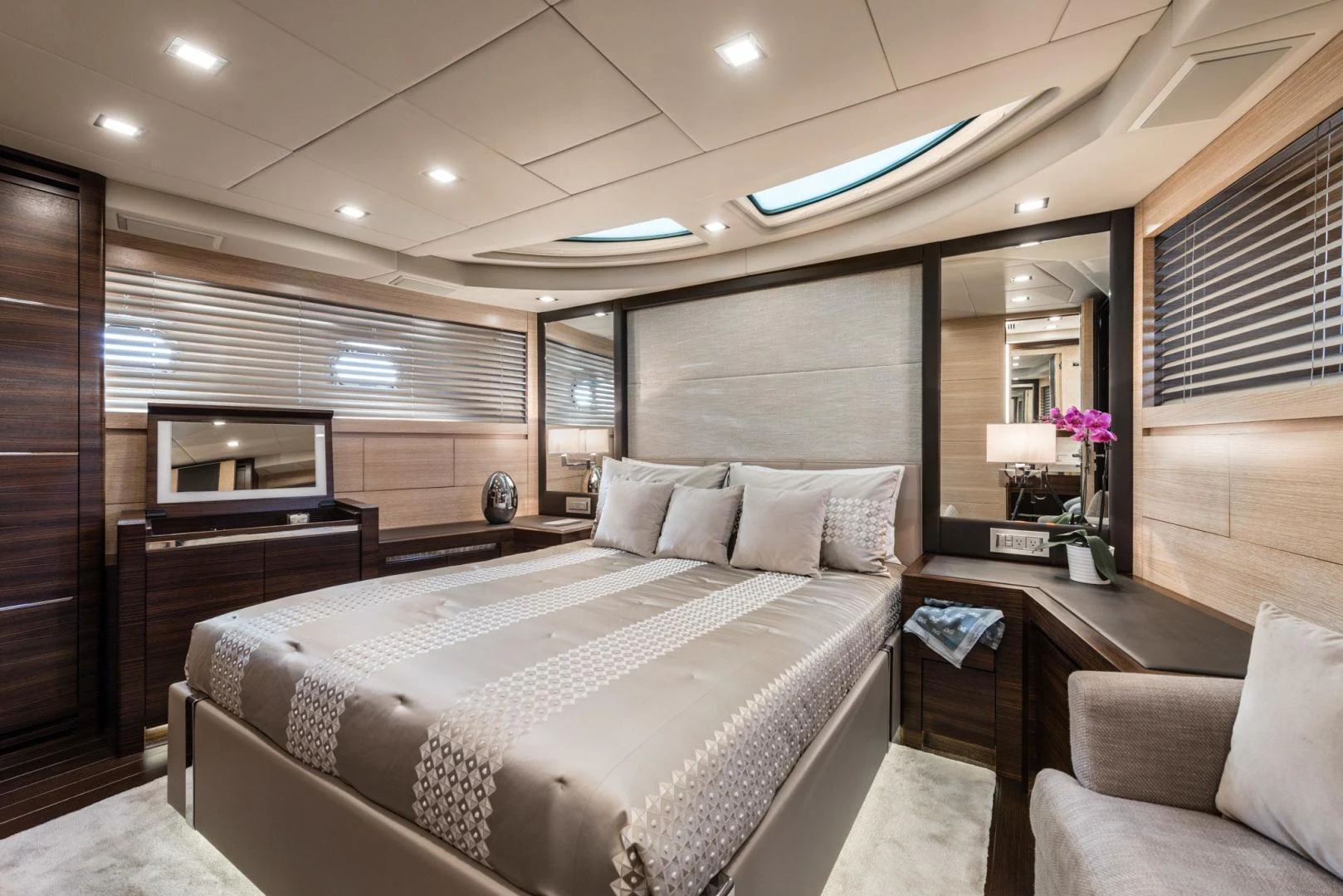 a large bedroom with a large bed aboard WINGS SPREAD Yacht for Sale