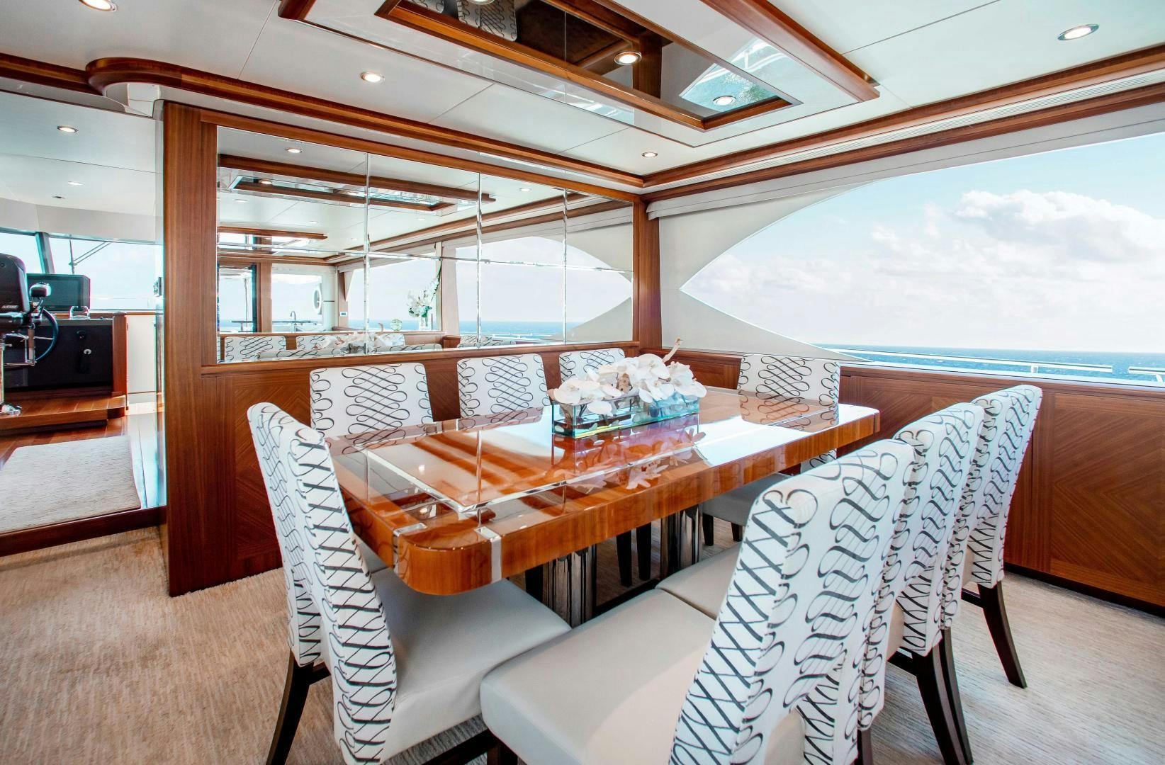 a dining table on a boat aboard TRINITY Yacht for Sale