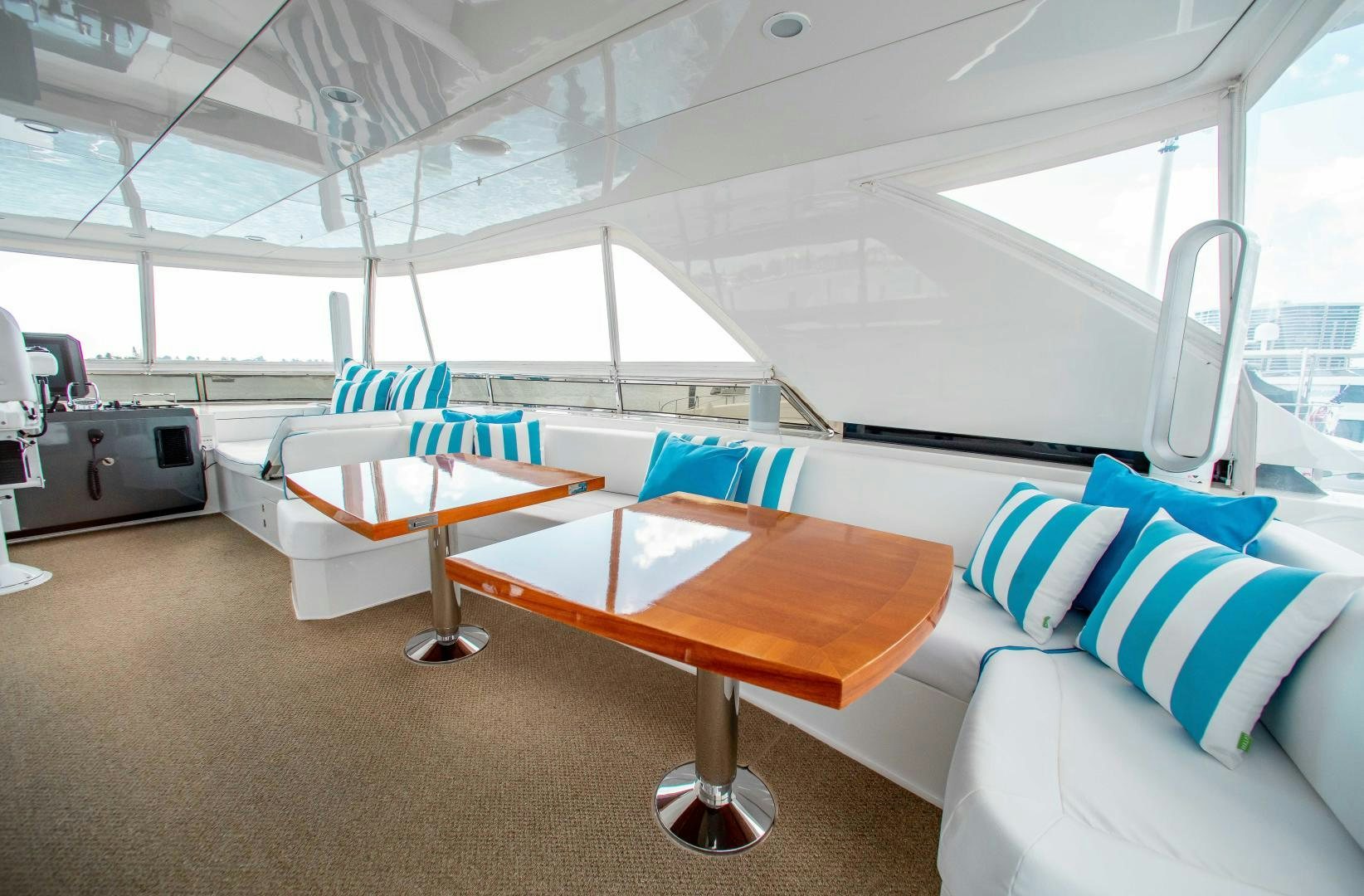 a room with a bed and a table aboard TRINITY Yacht for Sale