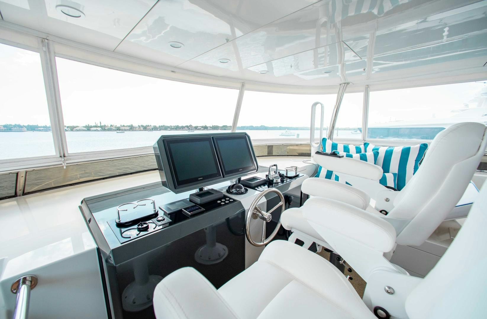 a room with a desk and a computer aboard TRINITY Yacht for Sale