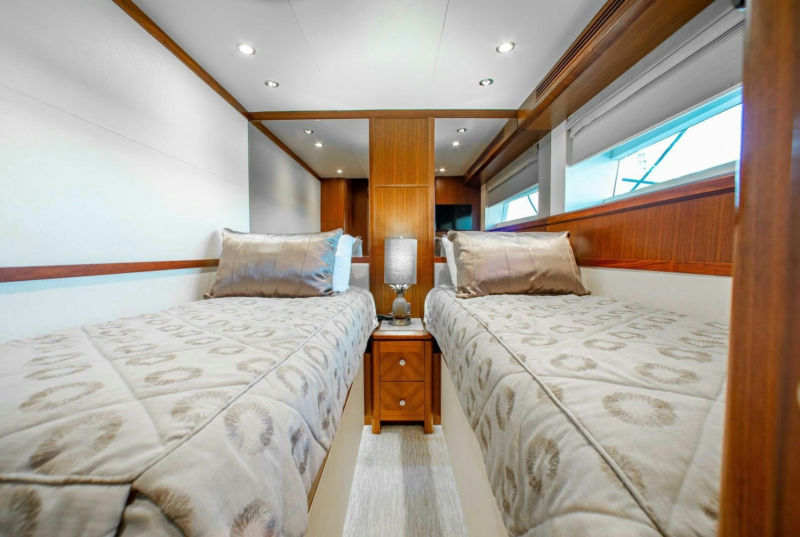 a couple of beds in a room aboard TRINITY Yacht for Sale
