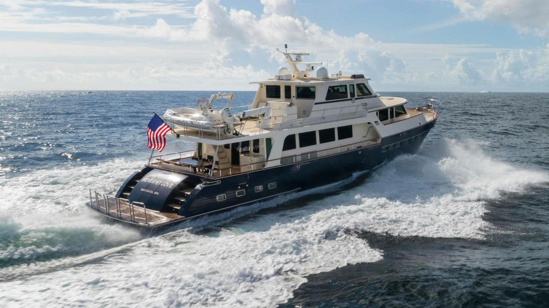 a boat on the water aboard NEVER MY LOVE Yacht for Sale