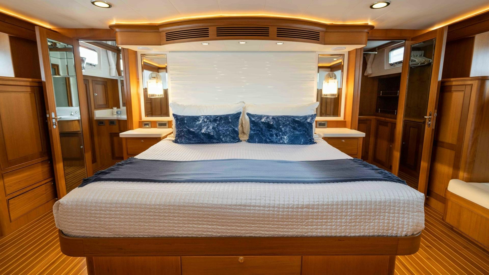 a bed in a room aboard NEVER MY LOVE Yacht for Sale