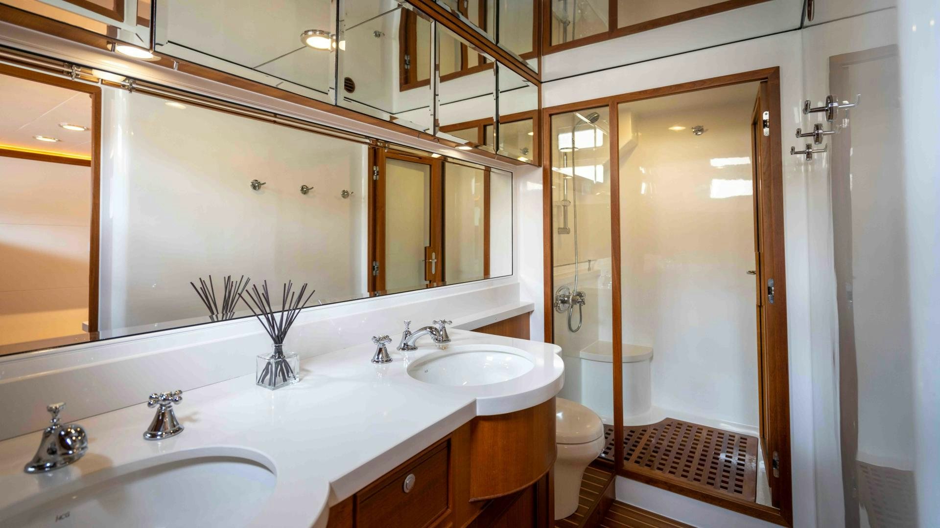 a bathroom with a sink and a toilet aboard NEVER MY LOVE Yacht for Sale