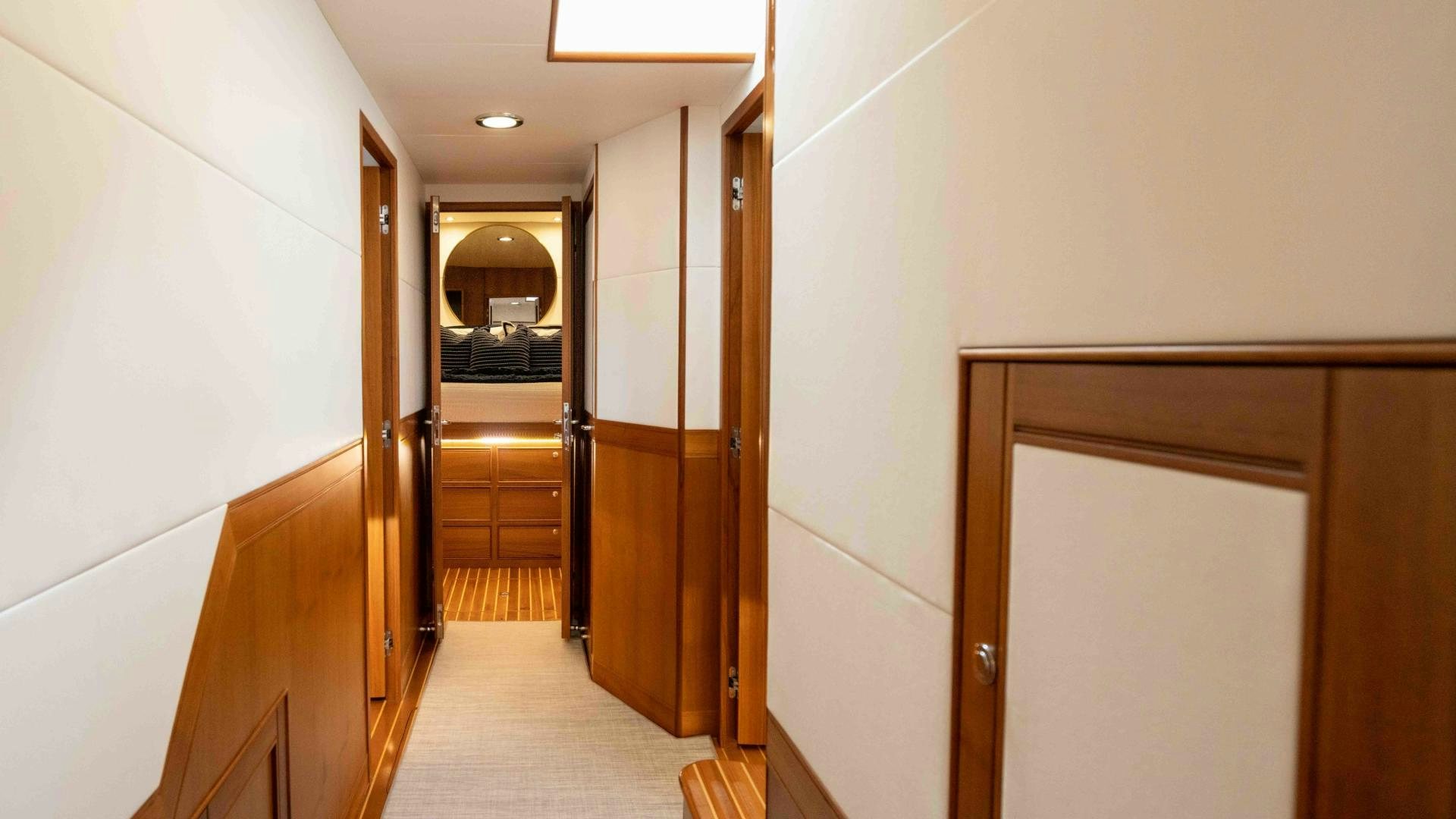 a hallway with doors aboard NEVER MY LOVE Yacht for Sale