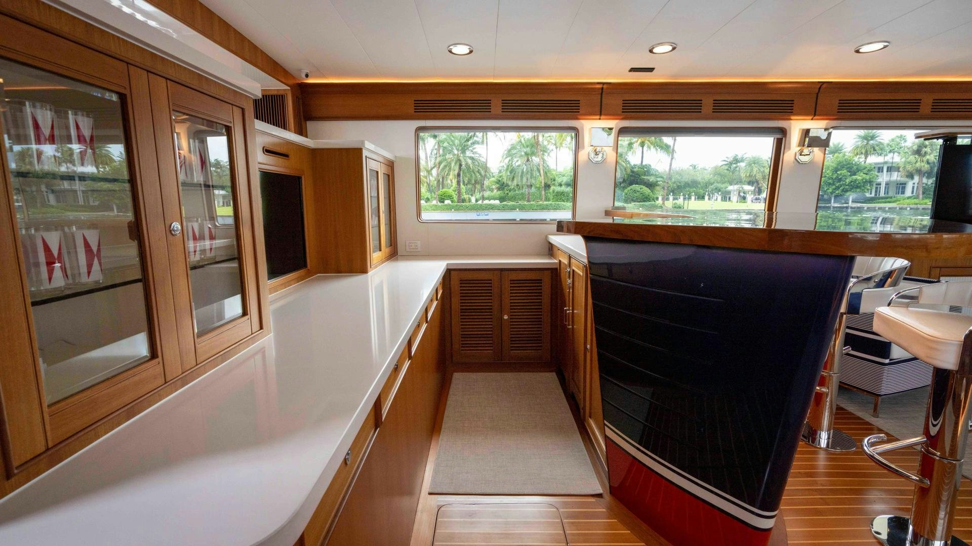 a kitchen with a large window aboard NEVER MY LOVE Yacht for Sale