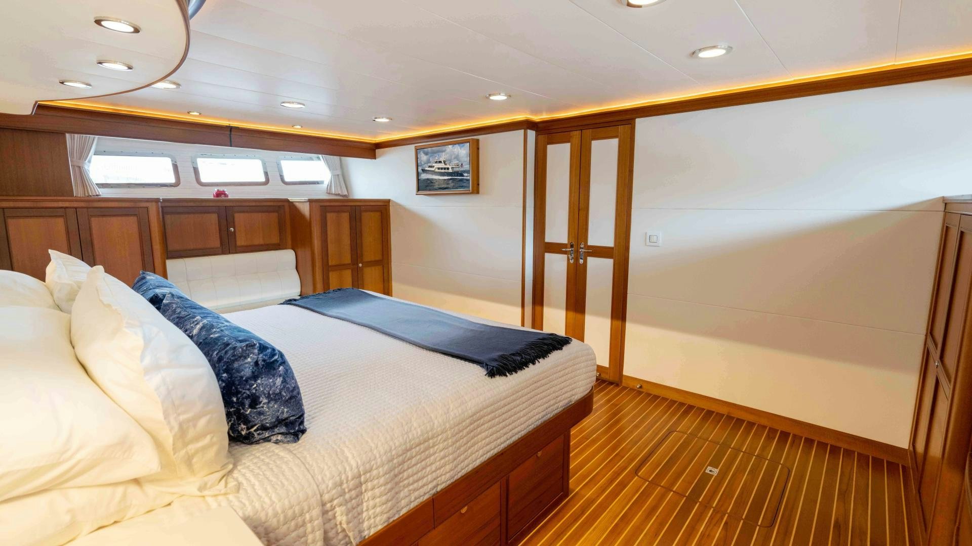 a bed in a room aboard NEVER MY LOVE Yacht for Sale
