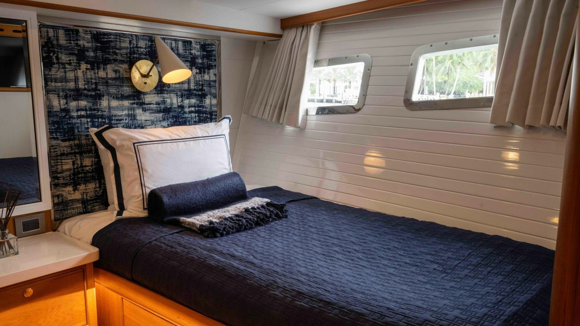a bed in a room aboard NEVER MY LOVE Yacht for Sale