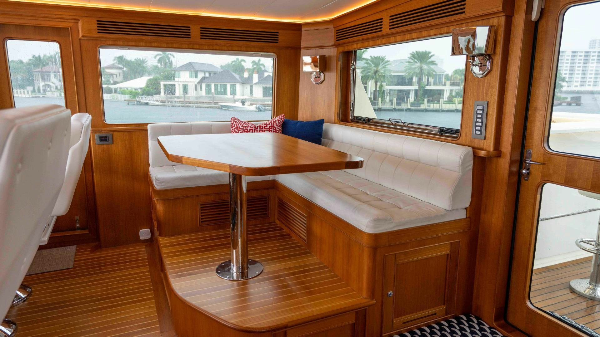 a room with a table and chairs aboard NEVER MY LOVE Yacht for Sale