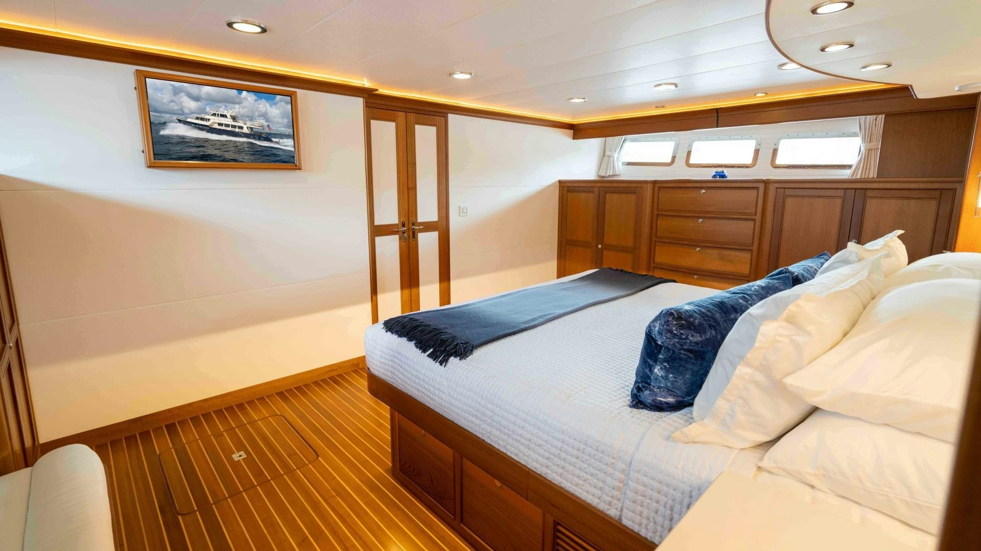 a bed in a room aboard NEVER MY LOVE Yacht for Sale