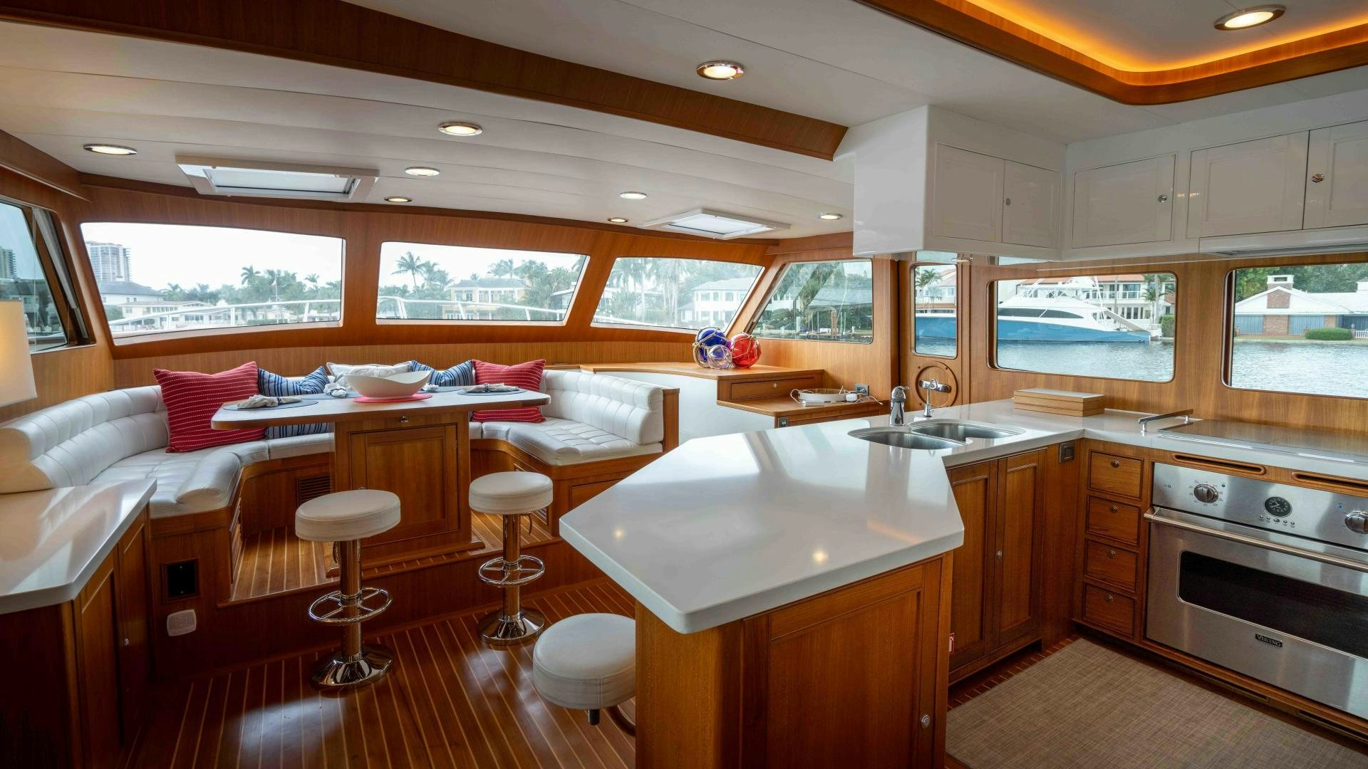 a kitchen with a bed and a couch aboard NEVER MY LOVE Yacht for Sale