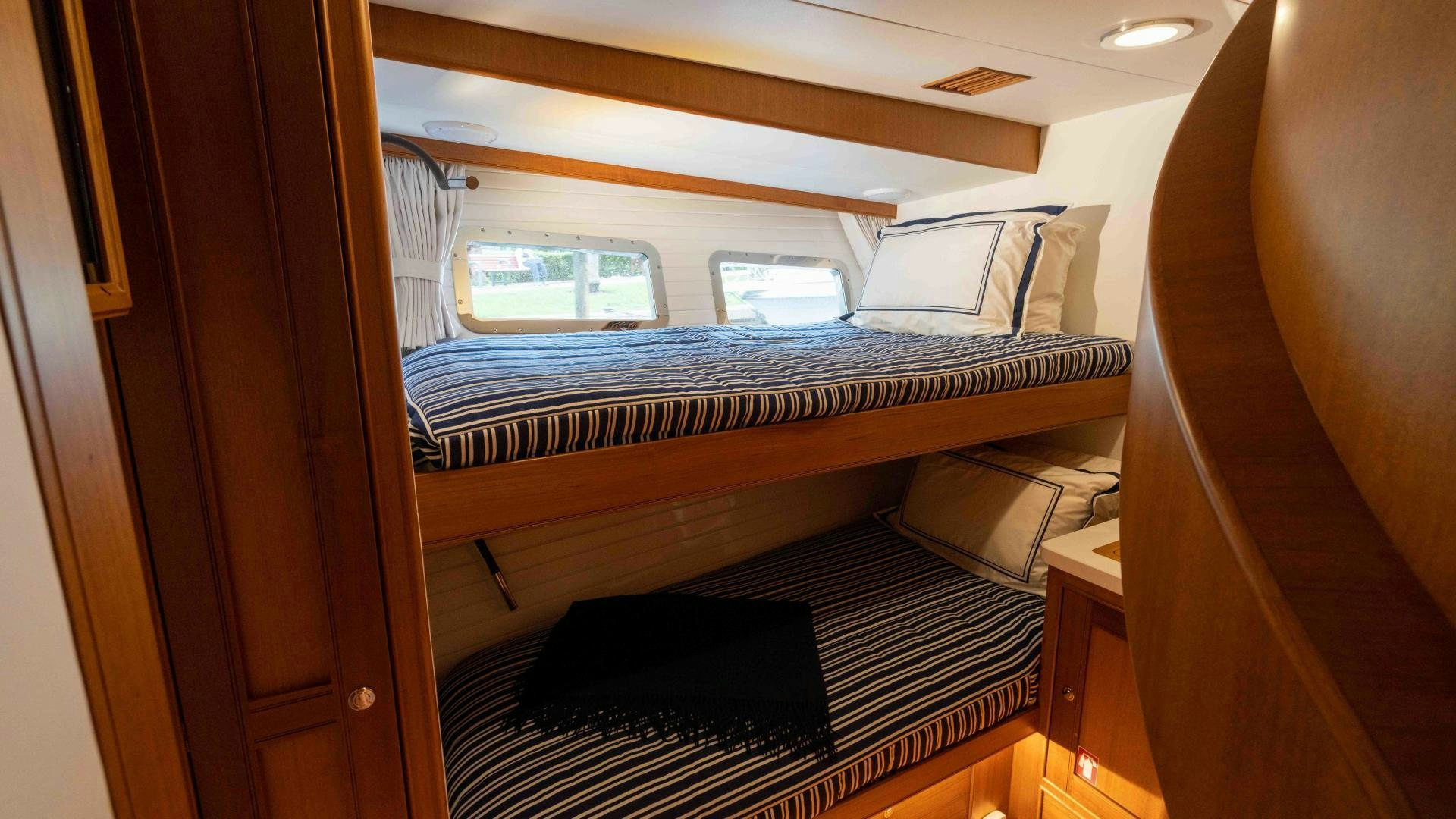 a bed in a room aboard NEVER MY LOVE Yacht for Sale