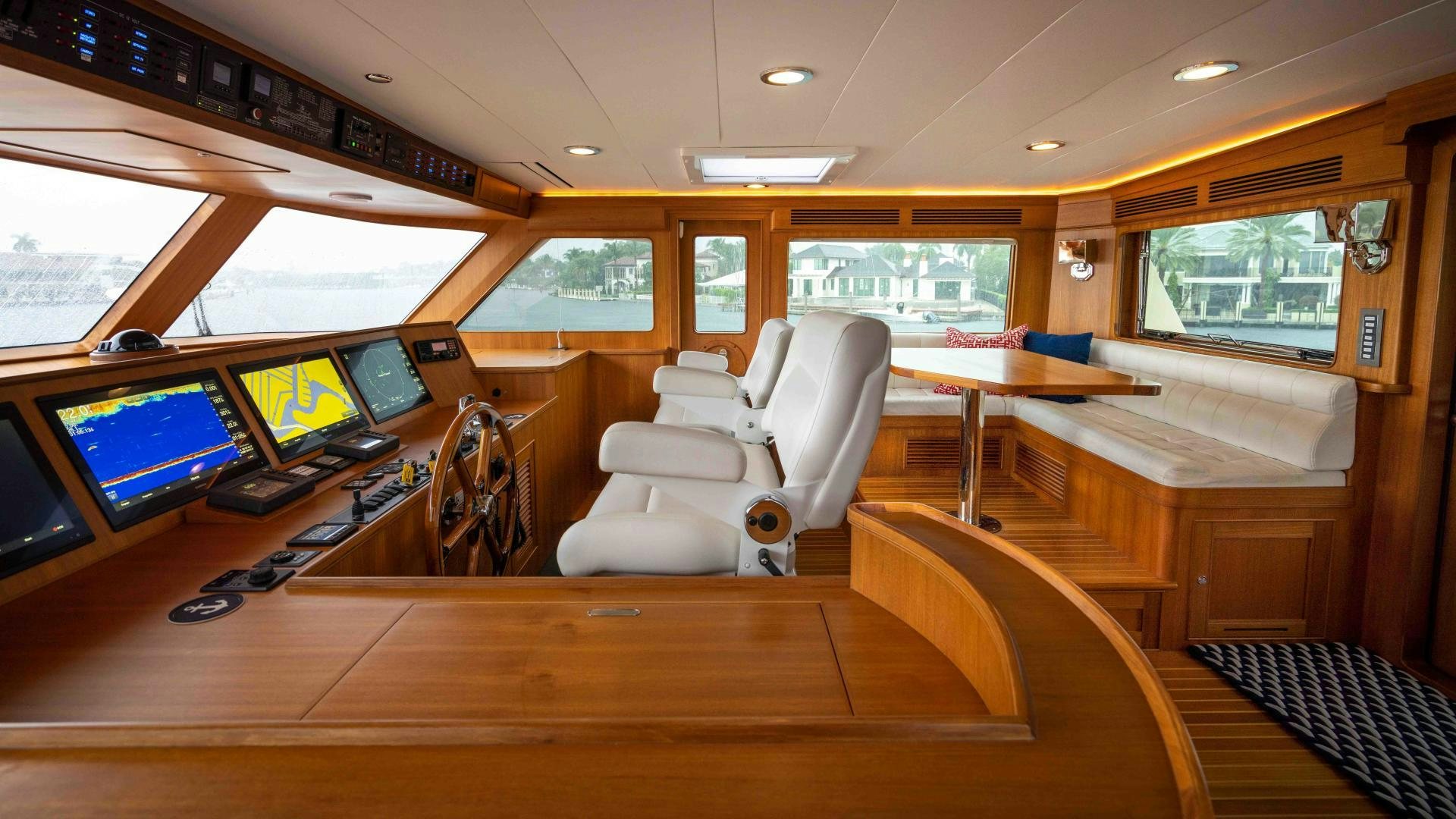 a room with a desk and chairs aboard NEVER MY LOVE Yacht for Sale