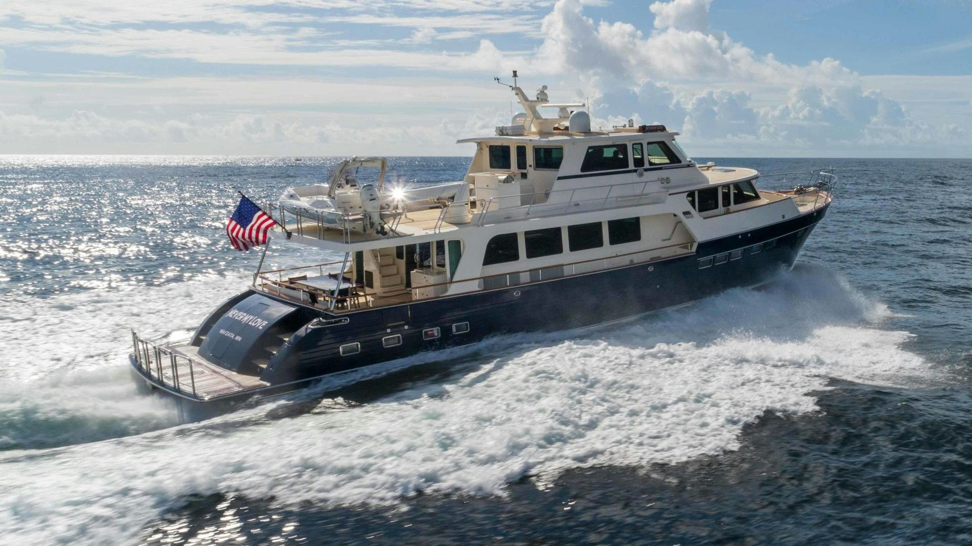 a boat on the water aboard NEVER MY LOVE Yacht for Sale