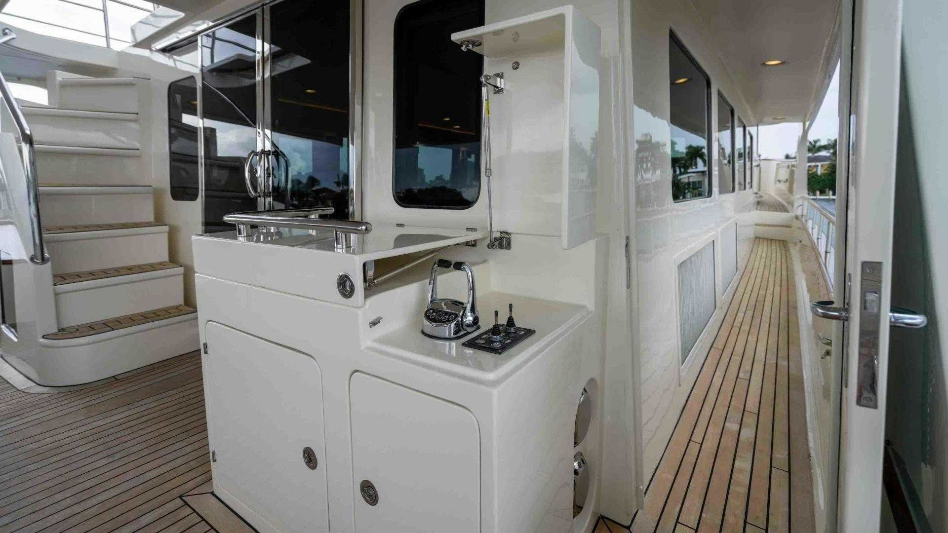 a kitchen with white cabinets aboard NEVER MY LOVE Yacht for Sale