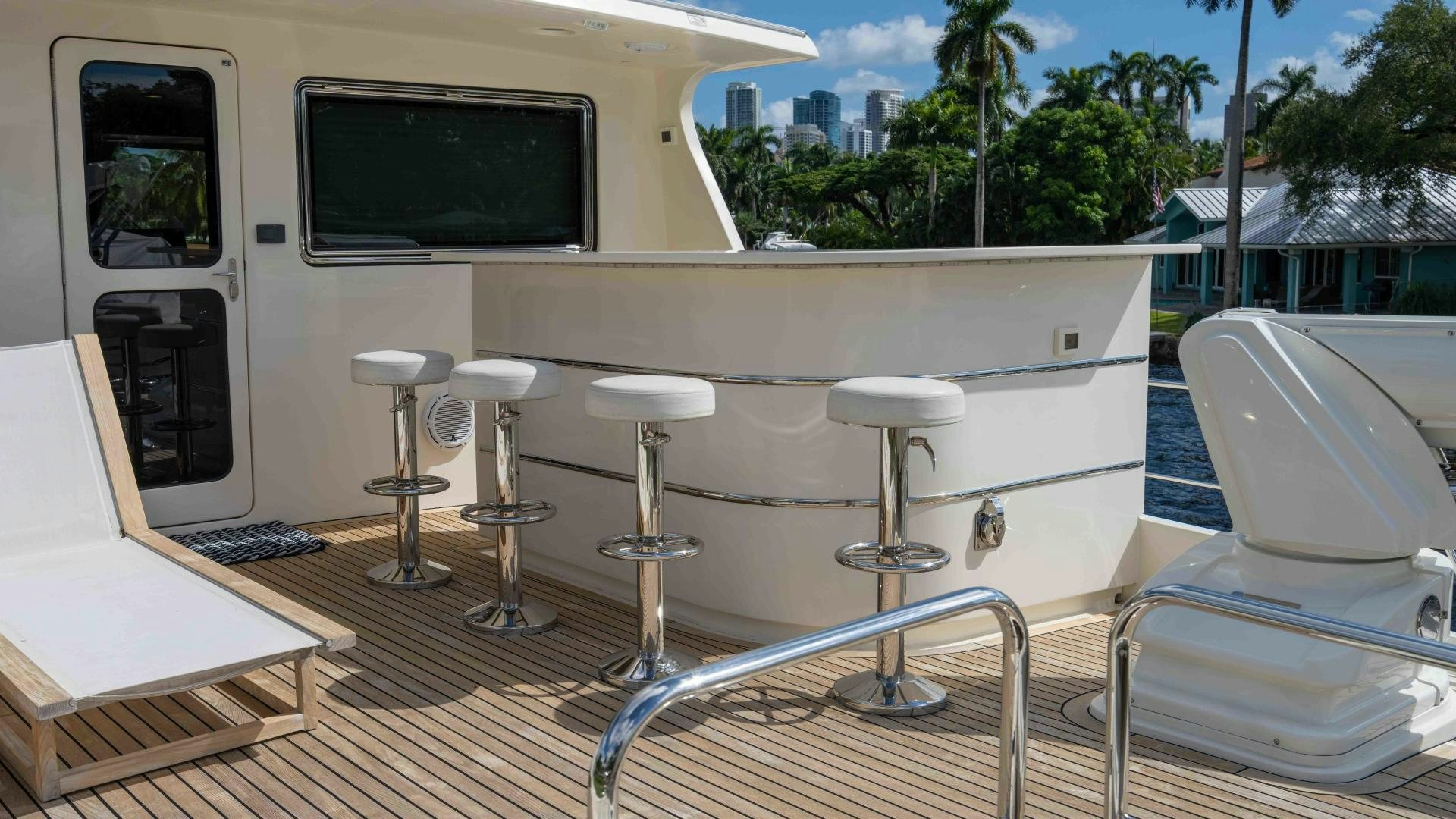 a room with stools and stools aboard NEVER MY LOVE Yacht for Sale